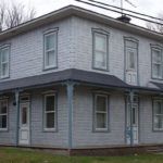 Maison cubique en tôle bosselée (début du 20e siècle)